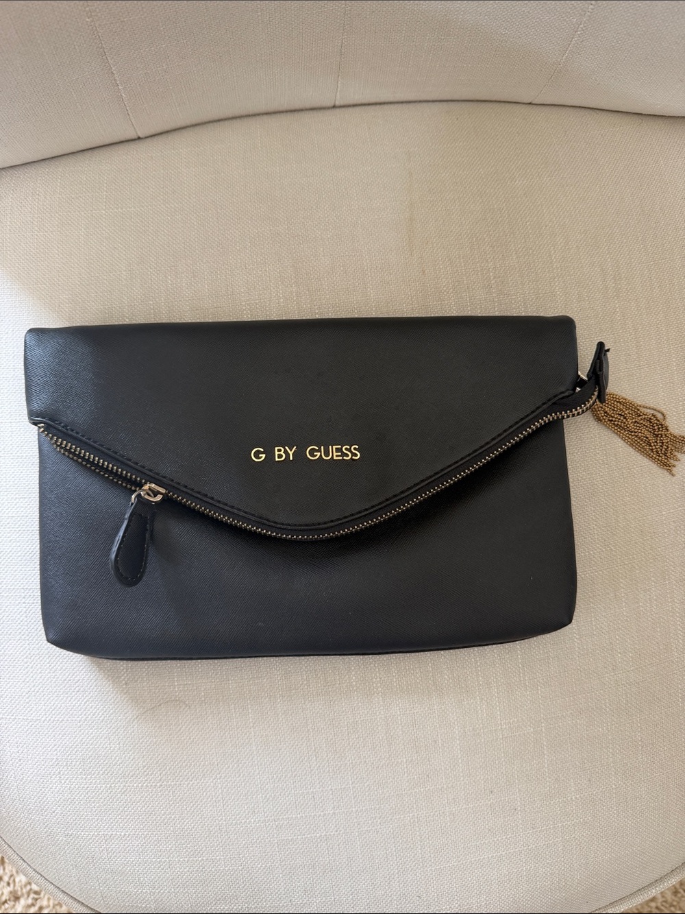 G by Guess Black Envelope Clutch with Gold Tassel